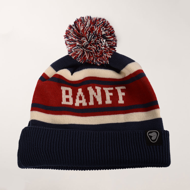 Banff toque final with navy, white and red stripes and block letters