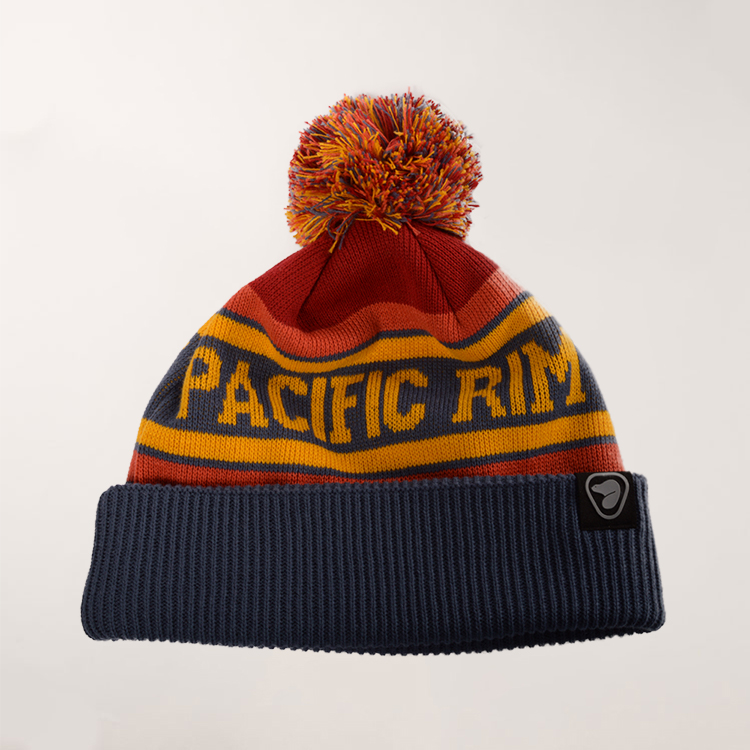 Pacific Rim toque final with red, orange, yellow and blue stripes and block letters